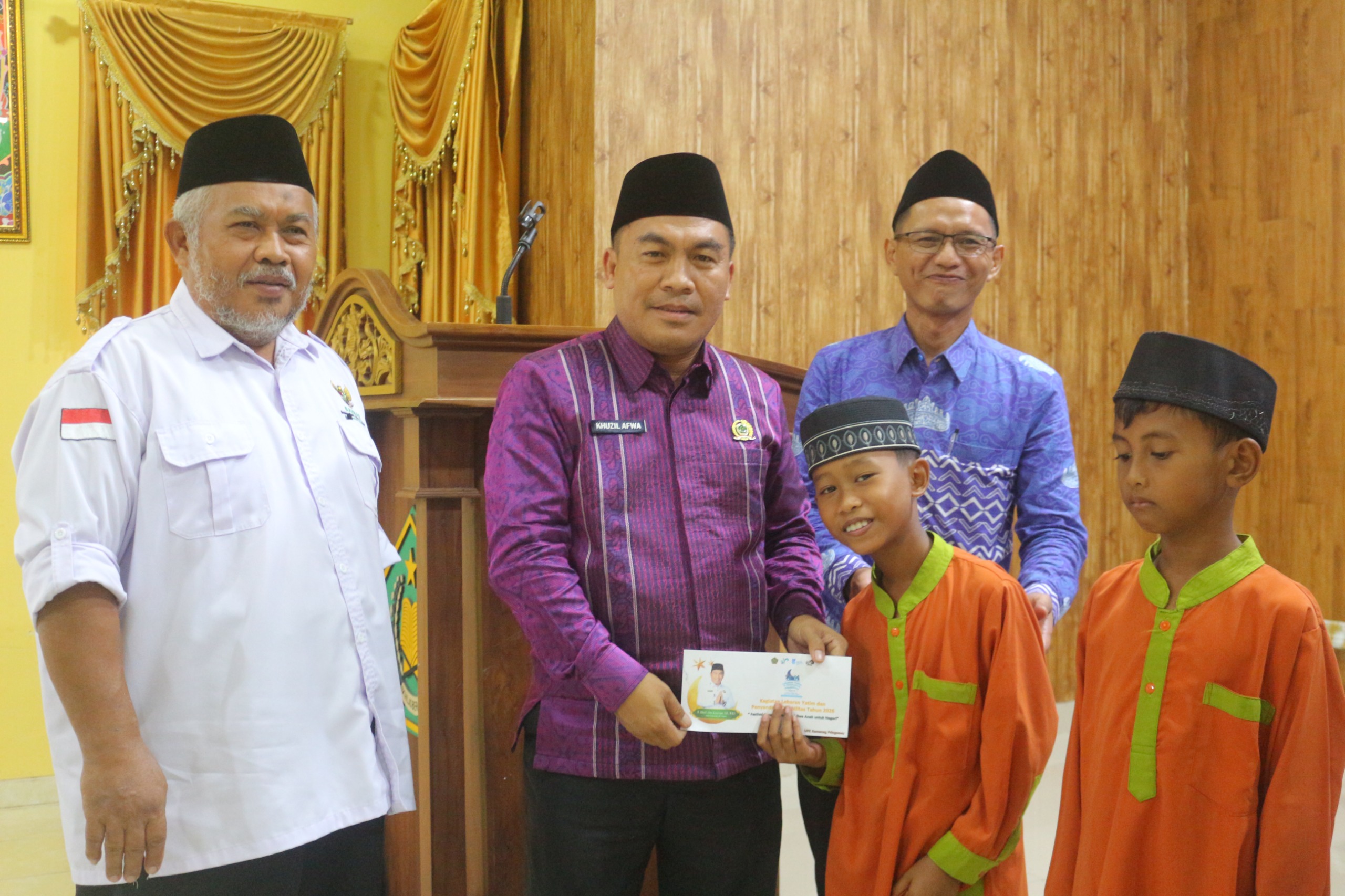 Sebanyak 175 Paket Santunan Disalurkan Kemenag Pringsewu untuk Anak Yatim dan Penyandang Disabilitas