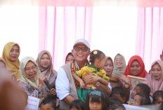 Dukung Program Pemerintah Pusat, Bupati Lampung Tengah Berikan Susu Gratis pada Anak SD